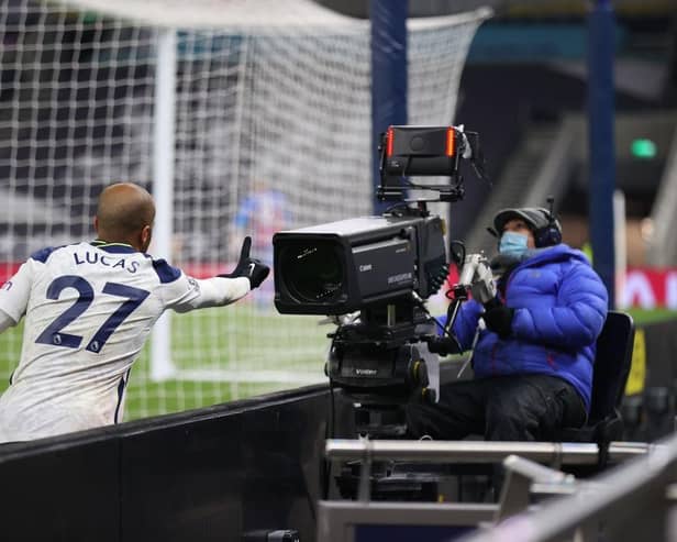 LONDON, ENGLAND - MARCH 07: Lucas Moura of Tottenham Hotspur celebrates his side's victory into a TV Camera after the Premier League match between Tottenham Hotspur and Crystal Palace at Tottenham Hotspur Stadium on March 07, 2021 in London, England. Sporting stadiums around the UK remain under strict restrictions due to the Coronavirus Pandemic as Government social distancing laws prohibit fans inside venues resulting in games being played behind closed doors. (Photo by Julian Finney/Getty Images)