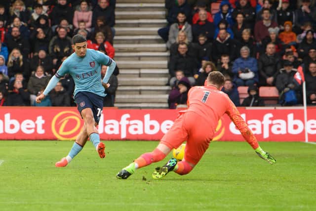 Burnley's Anass Zaroury (left) scores his side's second goal 

The Emirates FA Cup Third Round - Bournemouth v Burnley - Saturday 7th January 2023 - Dean Court - Bournemouth