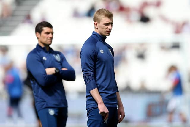 LONDON, ENGLAND - APRIL 17: Club Captain Ben Mee of Burnley looks on as their sides warms up prior to the Premier League match between West Ham United and Burnley at London Stadium on April 17, 2022 in London, England. (Photo by Steve Bardens/Getty Images)
