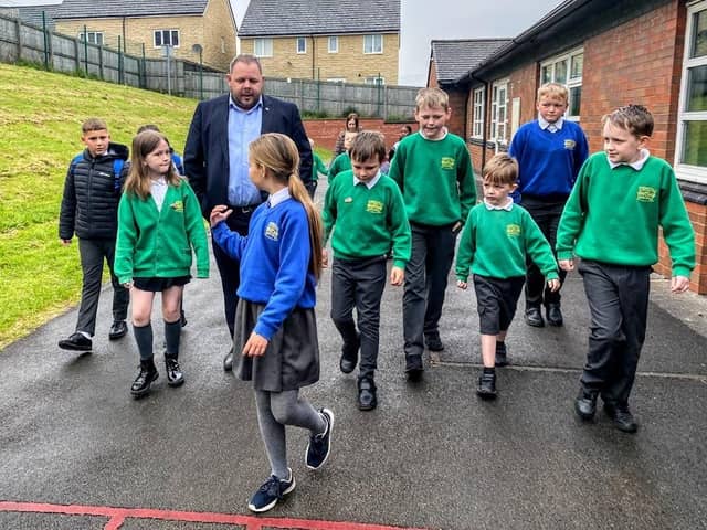 Burnley MP Antony Higginbotham joined students from Springfield Primary School for Lancashire Walk to School day