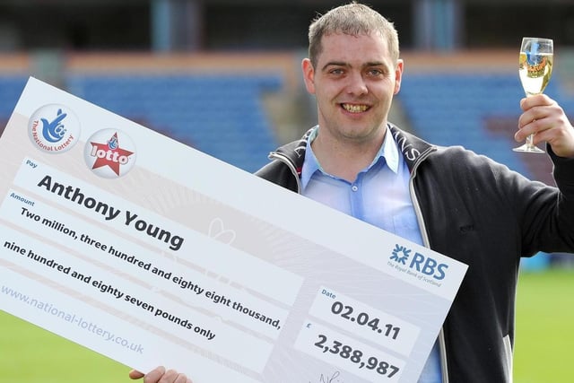 Burnley FC fan Anthony Young celebrates his £2.38 million lottery win at Turf Moor in April 2011