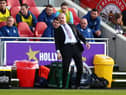 BRENTFORD, ENGLAND - MARCH 12: Sean Dyche, Manager of Burnley reacts from the sideline during the Premier League match between Brentford and Burnley at Brentford Community Stadium on March 12, 2022 in Brentford, England.