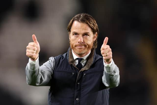 HULL, ENGLAND - OCTOBER 23: Scott Parker, Manager of Burnley, acknowledges the fans following the Sky Bet Championship match between Hull City AFC and Burnley FC at MKM Stadium on October 23, 2024 in Hull, England. (Photo by George Wood/Getty Images)