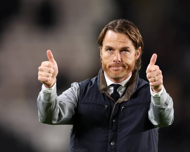 HULL, ENGLAND - OCTOBER 23: Scott Parker, Manager of Burnley, acknowledges the fans following the Sky Bet Championship match between Hull City AFC and Burnley FC at MKM Stadium on October 23, 2024 in Hull, England. (Photo by George Wood/Getty Images)