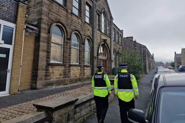 Police officers on patrol in Barnoldswick where a pig's head was left outside the site of a proposed mosque