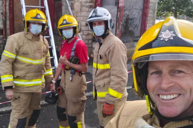 Firefighter Lee Clough (front right) is the subject of this week's 'My Burnley' feature