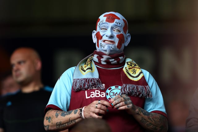 BURNLEY, ENGLAND - MAY 22: A fan looks on during the Premier League match between Burnley and Newcastle United at Turf Moor on May 22, 2022 in Burnley, England. (Photo by Jan Kruger/Getty Images)