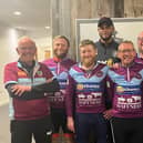 The riders and driver Graham Rushton pictured with Vincent Kompany at Burnley's Gawthorpe training ground. Submitted picture.