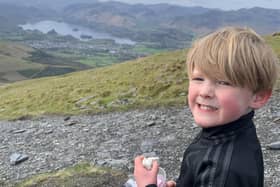 Five-year-old Laurie Mitton, of Barrowford, has raised more than £2,000 for the Ronald Macdonald House by climbing Mount Skiddaw in the Lake District.