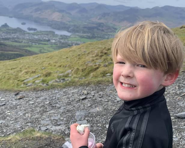 Five-year-old Laurie Mitton, of Barrowford, has raised more than £2,000 for the Ronald Macdonald House by climbing Mount Skiddaw in the Lake District.
