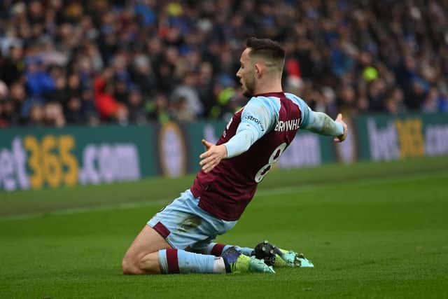 BRIGHTON, ENGLAND - FEBRUARY 19: Josh Brownhill of Burnley celebrates after scoring their team's 2nd goal during the Premier League match between Brighton & Hove Albion and Burnley at American Express Community Stadium on February 19, 2022 in Brighton, England. (Photo by Mike Hewitt/Getty Images)