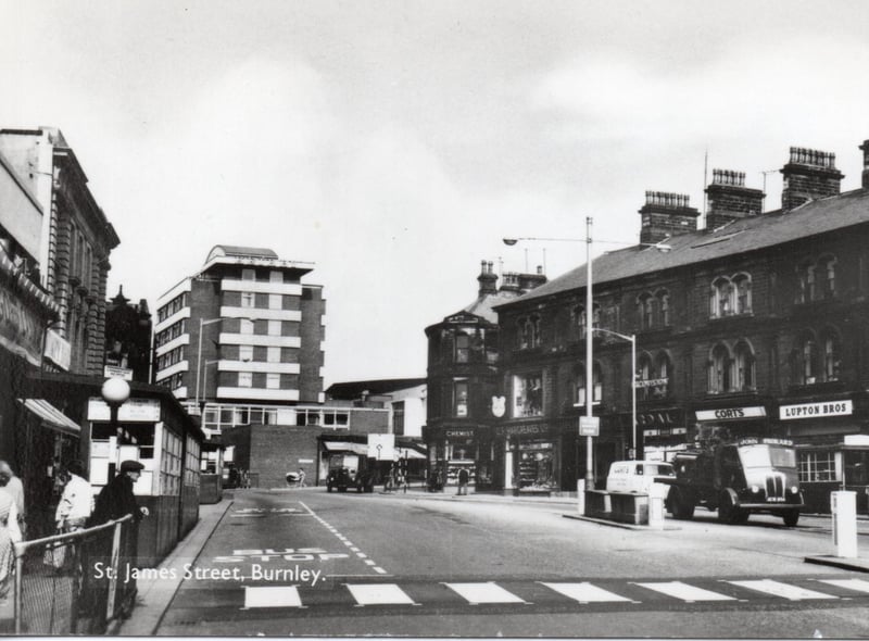 An image of St James Street showing that the positioning of the Kierby Hotel made it a central building in the town. On the right the shops were built in 1878 by the Padiham architect, Virgil Anderson. The shops included Lupton’s, Cort’s and Hargreave’s, the Golden Padlock
