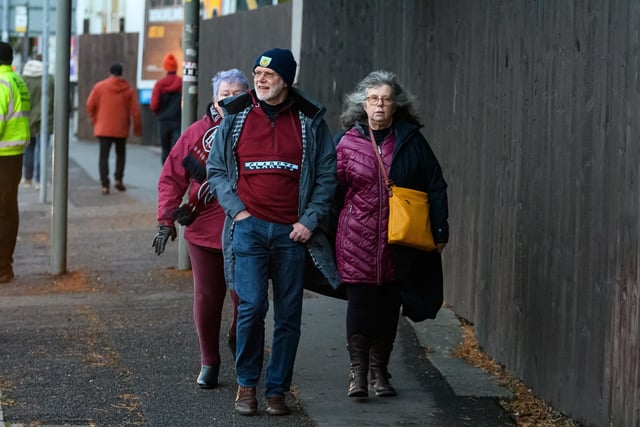 Burnley fans arrive at Turf Moor ahead of the Wednesday night fixture with Stoke City. Photo: Kelvin Stuttard