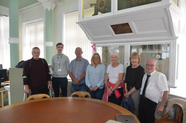 Members of Clitheroe Civic Society with librarian Chris Jewett, second left, and local historian Steve Ragnall, far right.