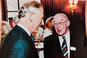 King Charles III, then the Prince of Wales, meeting former Burnley Football Club director John Sullivan at Holyrood House in Edinburgh
