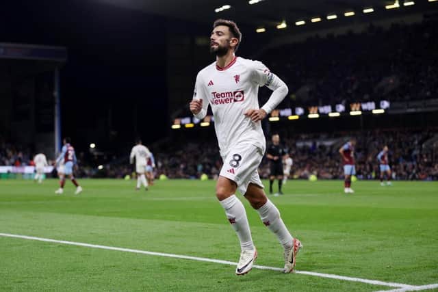BURNLEY, ENGLAND - SEPTEMBER 23: Bruno Fernandes of Manchester United celebrates after scoring their sides first goal during the Premier League match between Burnley FC and Manchester United at Turf Moor on September 23, 2023 in Burnley, England. (Photo by Lewis Storey/Getty Images)