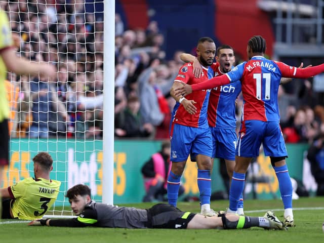 LONDON, ENGLAND - FEBRUARY 24: Jordan Ayew of Crystal Palace celebrates scoring his team's second goal with teammates during the Premier League match between Crystal Palace and Burnley FC at Selhurst Park on February 24, 2024 in London, England. (Photo by Richard Heathcote/Getty Images)
