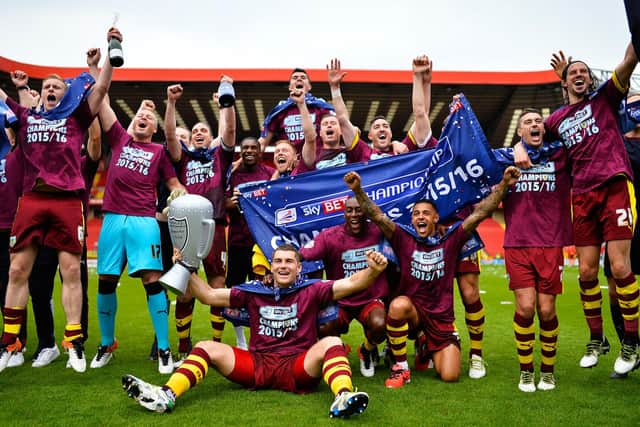 LONDON, ENGLAND - MAY 07:  Burnley players celebrate winning the Championship after the Sky Bet Championship between Charlton Athletic and Burnley at the Valley on May 7, 2016 in London, United Kingdom.  (Photo by Justin Setterfield/Getty Images)