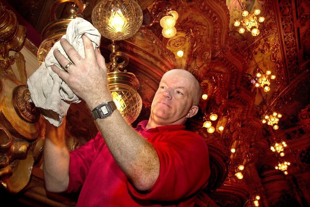 Team leader of maintenance at Blackpool Tower Dave Hulme polishing some of the lights in 2004