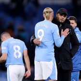 MANCHESTER, ENGLAND - JANUARY 31: Erling Haaland of Manchester City and Vincent Kompany, Manager of Burnley, embrace after the Premier League match between Manchester City and Burnley FC at Etihad Stadium on January 31, 2024 in Manchester, England. (Photo by Alex Livesey/Getty Images)