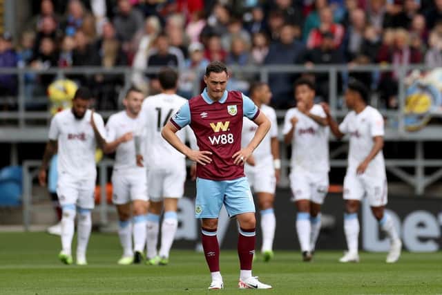 BURNLEY, ENGLAND - AUGUST 27: Connor Roberts of Burnley looks dejected after Matty Cash of Aston Villa (not pictured) scored their sides second goal during the Premier League match between Burnley FC and Aston Villa at Turf Moor on August 27, 2023 in Burnley, England. (Photo by Lewis Storey/Getty Images)