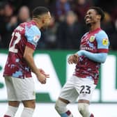 Burnley's Nathan Tella (right) celebrates with team-mate Vitinho after scoring his side's second goal 

The EFL Sky Bet Championship - Burnley v Wigan Athletic - Saturday 11th March 2023 - Turf Moor - Burnley