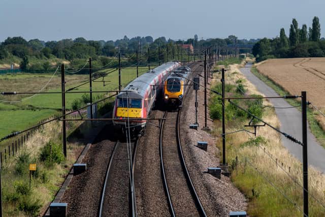 Trains travelling along the East Coast Mainline near the Colton Juction, Colton Lane, near Appleton Roebuck, North Yorkshire.