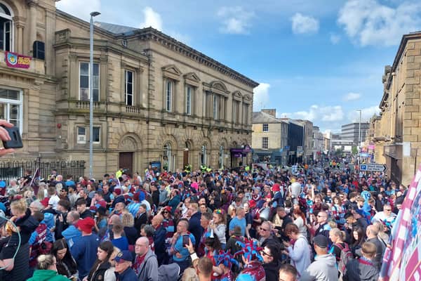 Thousands lined the streets outside Burnley Town Hall for the Burnley FC Championship trophy parade on May 9th