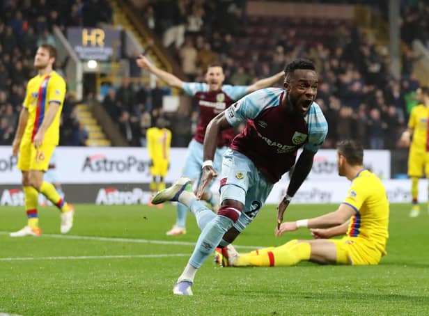 BURNLEY, ENGLAND - NOVEMBER 20: Maxwel Cornet of Burnley celebrates after scoring their team's third goal during the Premier League match between Burnley and Crystal Palace at Turf Moor on November 20, 2021 in Burnley, England. (Photo by Jan Kruger/Getty Images)