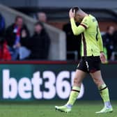 LONDON, ENGLAND - FEBRUARY 24: Josh Brownhill of Burnley reacts as he is sent off after being shown a red card during the Premier League match between Crystal Palace and Burnley FC at Selhurst Park on February 24, 2024 in London, England. (Photo by Richard Heathcote/Getty Images)