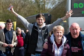 Burnley fans arrive at the Select Car Leasing Stadium ahead of the Championship fixture with Reading. Photo: Kelvin Stuttard