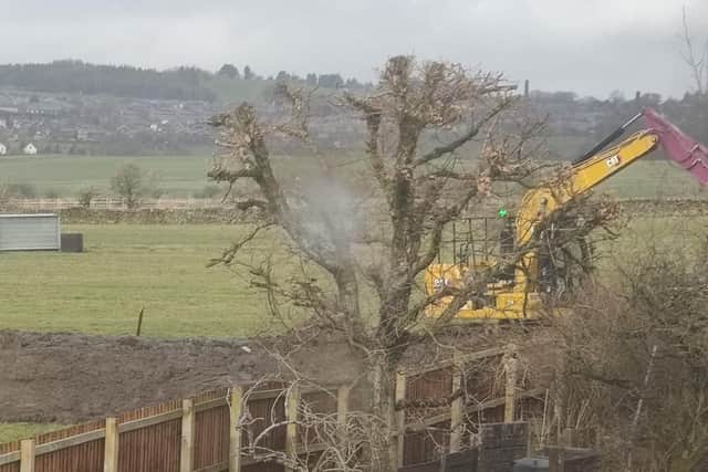 A digger on site at Smithyfield Avenue in Worsthorne