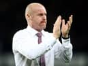 LIVERPOOL, ENGLAND - SEPTEMBER 13: Burnley manager Sean Dyche applauds his fans during the Premier League match between Everton  and  Burnley at Goodison Park on September 13, 2021 in Liverpool, England. (Photo by Jan Kruger/Getty Images)