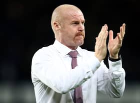 LIVERPOOL, ENGLAND - SEPTEMBER 13: Burnley manager Sean Dyche applauds his fans during the Premier League match between Everton  and  Burnley at Goodison Park on September 13, 2021 in Liverpool, England. (Photo by Jan Kruger/Getty Images)