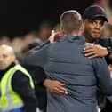 LUTON, ENGLAND - OCTOBER 03: Vincent Kompany, Manager of Burnley, embraces Rob Edwards, Manager of Luton Town, following the the Premier League match between Luton Town and Burnley FC at Kenilworth Road on October 03, 2023 in Luton, England. (Photo by Warren Little/Getty Images)