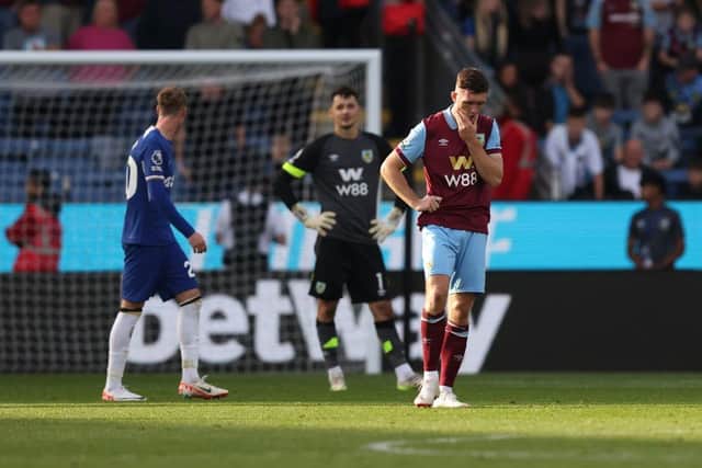 BURNLEY, ENGLAND - OCTOBER 07: Dara O'Shea of Burnley looks dejected after Nicolas Jackson of Chelsea (not pictured) scores their sides fourth goal during the Premier League match between Burnley FC and Chelsea FC at Turf Moor on October 07, 2023 in Burnley, England. (Photo by George Wood/Getty Images)