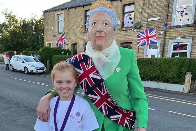 It looks the Queen herself popped along to the royal parade organised by Rosegrove Neighbourhood Watch
