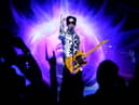 Musician Prince performs his first of three shows onstage during One Night... Three Venues hosted by Prince and Lotusflow3r.com held at NOKIA Theatre L.A. LIVE on March 28, 2009 in Los Angeles, California. (Photo by Kristian Dowling/Getty Images for Lotusflow3r.com)