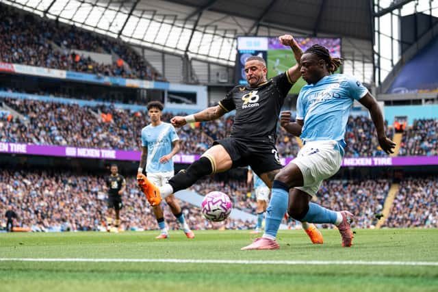 Kyle Walker blocks a cross from Jeremy Doku. Photo: Kelvin Lister-Stuttard