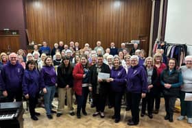 A Burnley choir was in fine voice at a concert that raised £1,820 for charity.