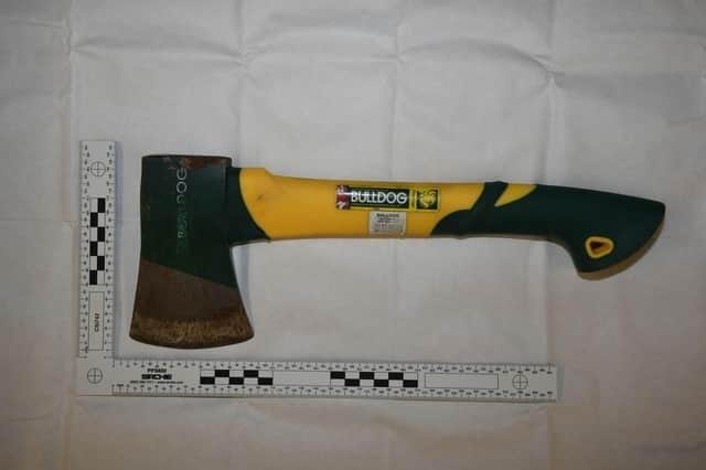 The axe that Andrew Burfield used to kill Katie Kenyon was found in the cellar of his home in Todmorden Road, Burnley