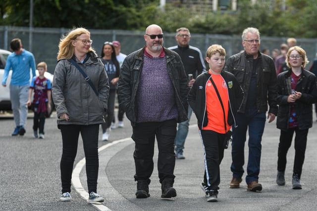 Burnley fans arrive at Turf Moor ahead of the fixture with Bristol City. Photo: Kelvin Stuttard