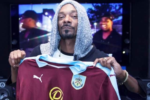 Snoop Dogg with the Burnley FC top gifted to him