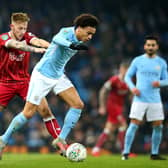 MANCHESTER, ENGLAND - JANUARY 09:  Leroy Sane of Manchester City and Josh Brownhill of Bristol City in action during the Carabao Cup Semi-Final First Leg match between Manchester City and Bristol City at Etihad Stadium on January 9, 2018 in Manchester, England.  (Photo by Alex Livesey/Getty Images)