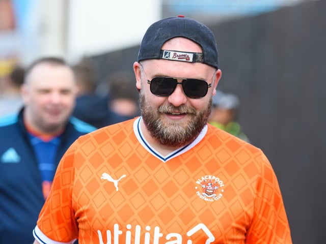 Blackpool fans arrive at Turf Moor ahead of the fixture with Burnley. Photo: Kelvin Stuttard