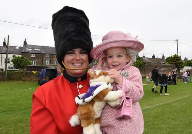 Dressed to impress  - Gemma Fergusson and River, two,  pictured after the parade