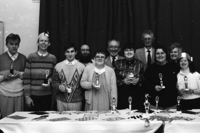Community Service Award winners Peter, with tankard, and Sheila, with rose bowl. With the some of the other winners and, rear left to right, Mr Roman and Gannow Community Centre’s chairman Tom Houseman and president Coun. Richard Robinson