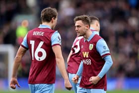 BURNLEY, ENGLAND - MARCH 16: Jacob Bruun Larsen of Burnley celebrates scoring his team's first goal with teammate Sander Berge  during the Premier League match between Burnley FC and Brentford FC at Turf Moor on March 16, 2024 in Burnley, England. (Photo by Matt McNulty/Getty Images)