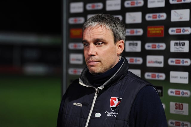 CHELTENHAM, ENGLAND - MARCH 16: Michael Duff, Manager of Cheltenham Town talks to the media pitchside after the Sky Bet League Two match between Cheltenham Town and Barrow at The Jonny-Rocks Stadium on March 16, 2021 in Cheltenham, England. Sporting stadiums around the UK remain under strict restrictions due to the Coronavirus Pandemic as Government social distancing laws prohibit fans inside venues resulting in games being played behind closed doors.  (Photo by Alex Burstow/Getty Images)