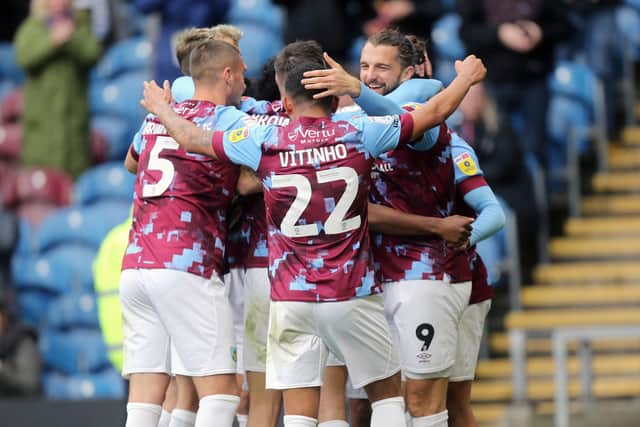 Burnley's Jay Rodriguez (right) celebrates scoring his side's fourth goal with team-mates

The EFL Sky Bet Championship - Burnley v Swansea City - Saturday 15th October 2022 - Turf Moor - Burnley